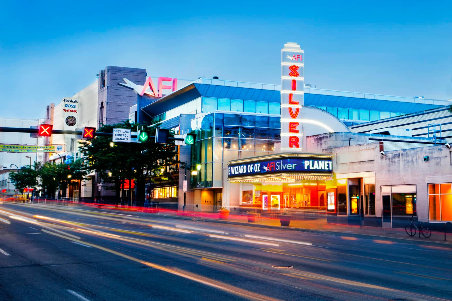 The AFI Silver Theatre on Colesville Road in downtown Silver Spring, MD, with its iconic vertical Silver marquee at twilight